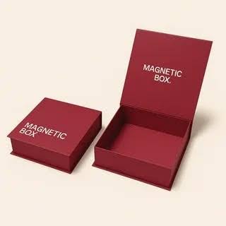 Custom maroon magnetic rigid box shown closed next to an open premium magnetic gift box with matching interior